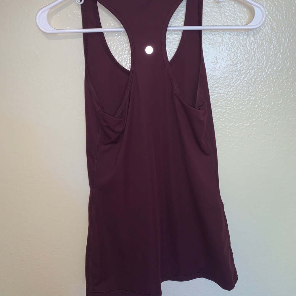Workout tank top by Yogalicious maroon in color